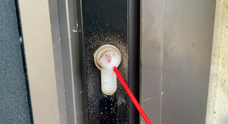 Unlocking a jammed door with a professional locksmith tool in Billings, MT